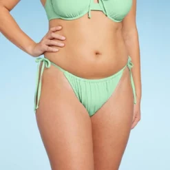 Women's Side-Tie Low-Rise High Leg Adjustable Lurex Bikini Bottom - Wild Fable™ 7 Women's Side-Tie Low-Rise High Leg Adjustable Lurex Bikini Bottom - Wild Fable™ -Wild Fable GUEST 03da585c 0255 4409 8704 571a861ba24c