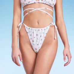 Women's Floral Print Side-Tie Ultra High Leg Adjustable Coverage Bikini Bottom - Wild Fable™ White 13 Women's Floral Print Side-Tie Ultra High Leg Adjustable Coverage Bikini Bottom - Wild Fable™ White -Wild Fable GUEST 4400ff04 b52e 42fd bde2 19d3bea06cd1