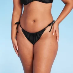 Women's Side-Tie Scoop Front High Leg Adjustable Bikini Bottom - Wild Fable™ 11 Women's Side-Tie Scoop Front High Leg Adjustable Bikini Bottom - Wild Fable™ -Wild Fable GUEST 45f5743a ffef 4025 9592 f7b417101726