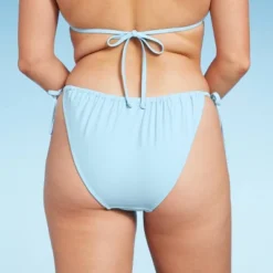 Women's Side-Tie Low-Rise High Leg Adjustable Bikini Bottom - Wild Fable™ Blue 8 Women's Side-Tie Low-Rise High Leg Adjustable Bikini Bottom - Wild Fable™ Blue -Wild Fable GUEST 924af3bc 7a86 4a95 8319 2249382b46e6