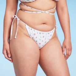 Women's Floral Print Side-Tie Ultra High Leg Adjustable Coverage Bikini Bottom - Wild Fable™ White 9 Women's Floral Print Side-Tie Ultra High Leg Adjustable Coverage Bikini Bottom - Wild Fable™ White -Wild Fable GUEST a76abeab 66b2 4843 943b d7f414064e80