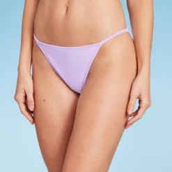 Women's Tab Side Cheeky Bikini Bottom - Wild Fable™ 18 Women's Tab Side Cheeky Bikini Bottom - Wild Fable™ -Wild Fable GUEST ba5fd7d2 bb7a 4b61 8dab 1e1de03a1116