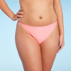 Women's Side Tab Cheeky Bikini Bottom - Wild Fable™ Pink -Wild Fable GUEST be953595 fa77 415b 9c1f f81a7d086544