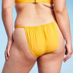 Women's Scarf Side Adjustable Coverage Bikini Bottom - Wild Fable™ Yellow -Wild Fable GUEST cc54eec2 bd8d 413c 8393 ec32899df003