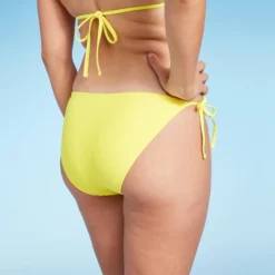 Women's Side-Tie Cheeky Bikini Bottom - Wild Fable™ Yellow 10 Women's Side-Tie Cheeky Bikini Bottom - Wild Fable™ Yellow -Wild Fable GUEST d60575f0 7377 464a 8b1f bea4ae4f1fb7